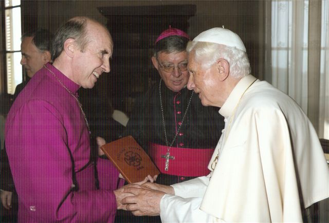 Giving the PNG Anglican prayer book to the Pope
